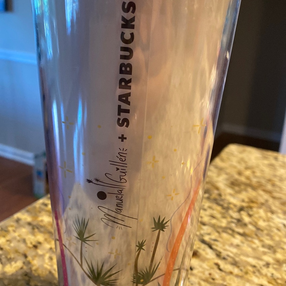Starbucks cups by manuela Guillen